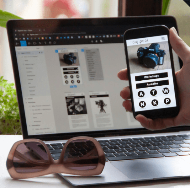 Phone and laptop showing a visual interface design